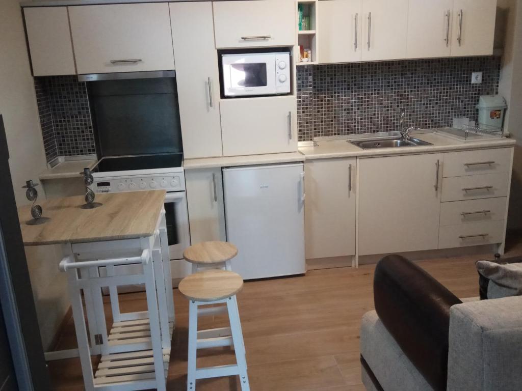 Kuchyňa alebo kuchynka v ubytovaní Studiο_loft