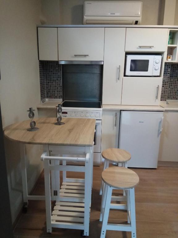 Kuchyňa alebo kuchynka v ubytovaní Studiο_loft