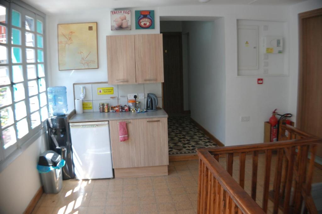 Kuchyň nebo kuchyňský kout v ubytování Harrys Inn Guesthouse