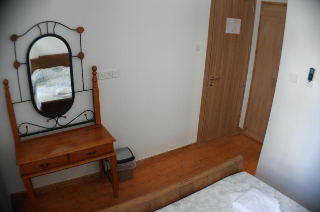 Postel nebo postele na pokoji v ubytování Harrys Inn Guesthouse