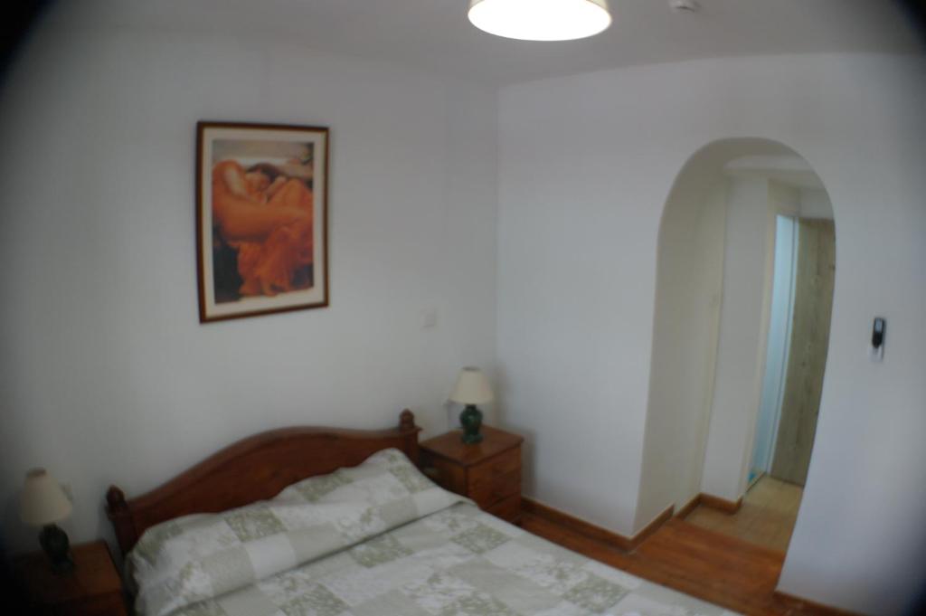 Postel nebo postele na pokoji v ubytování Harrys Inn Guesthouse
