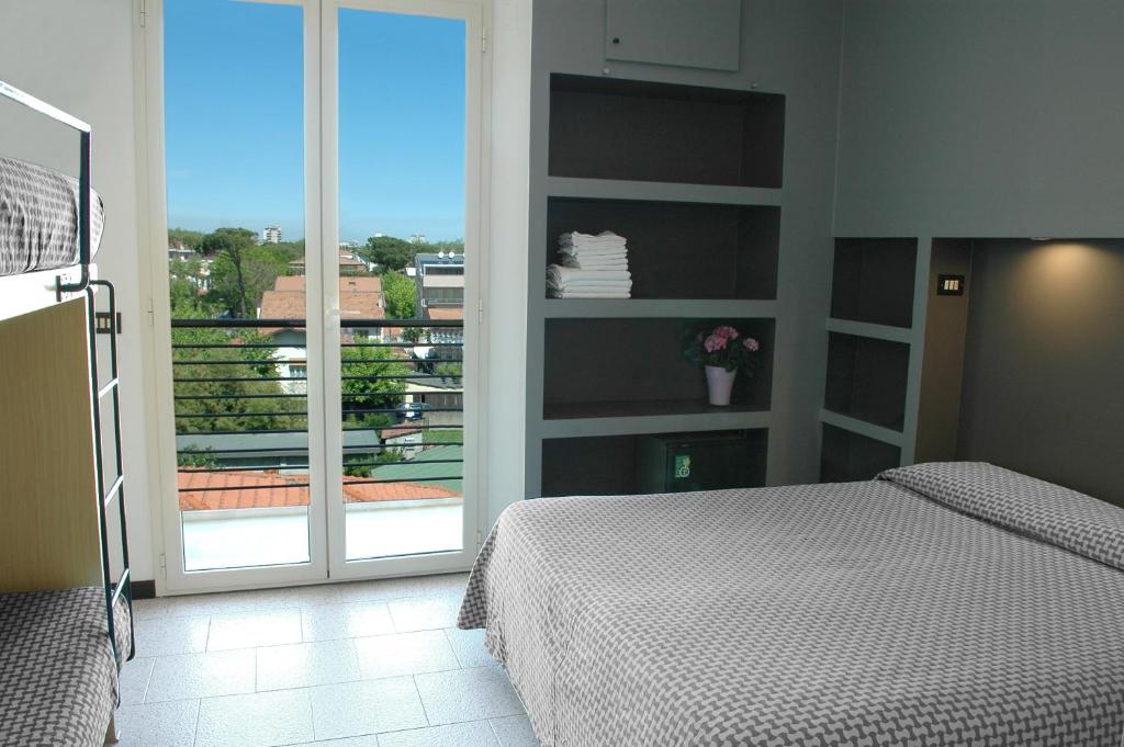 Postel nebo postele na pokoji v ubytování Hotel Marbella