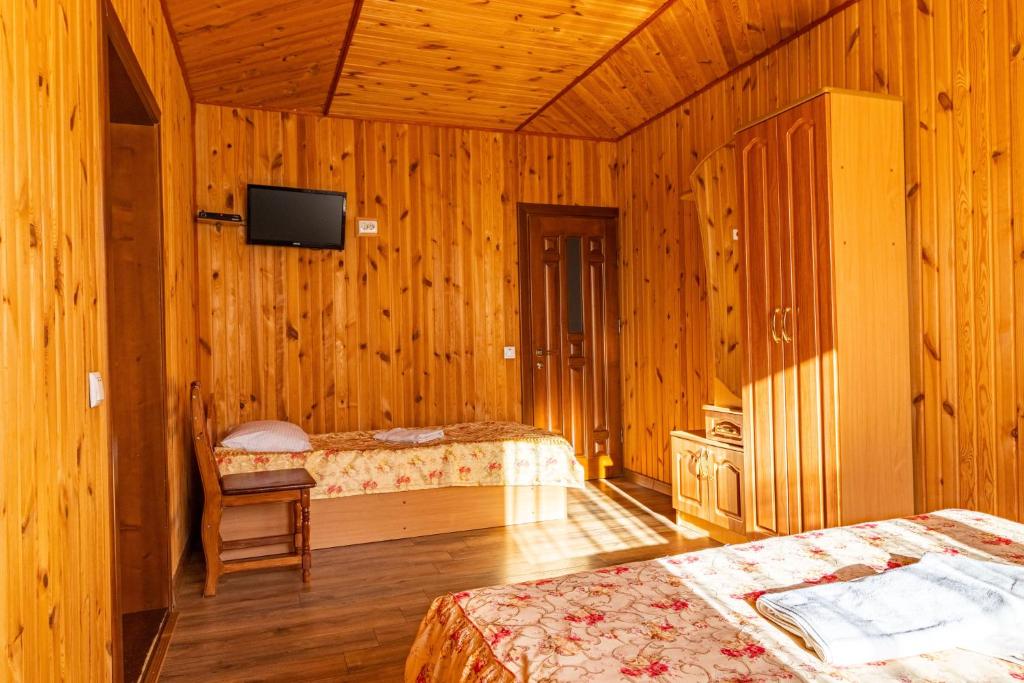 Postel nebo postele na pokoji v ubytování Smerichka