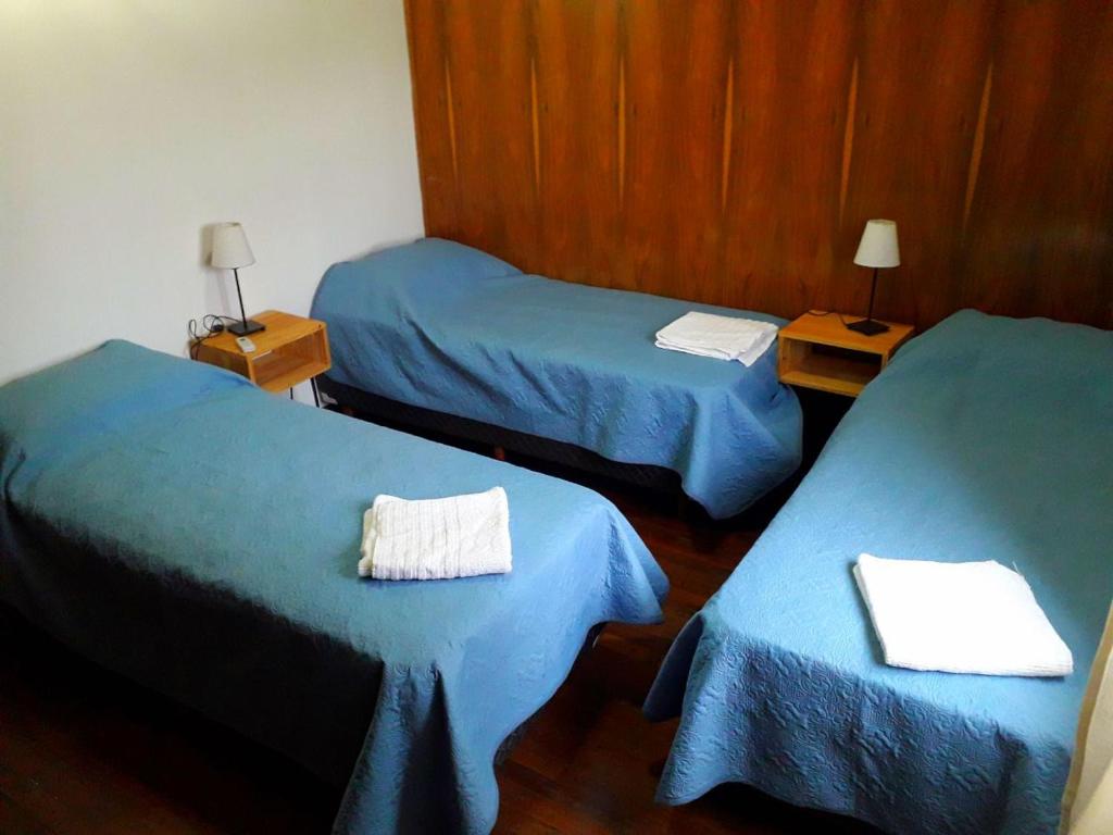 Postel nebo postele na pokoji v ubytování Tanino Guest House