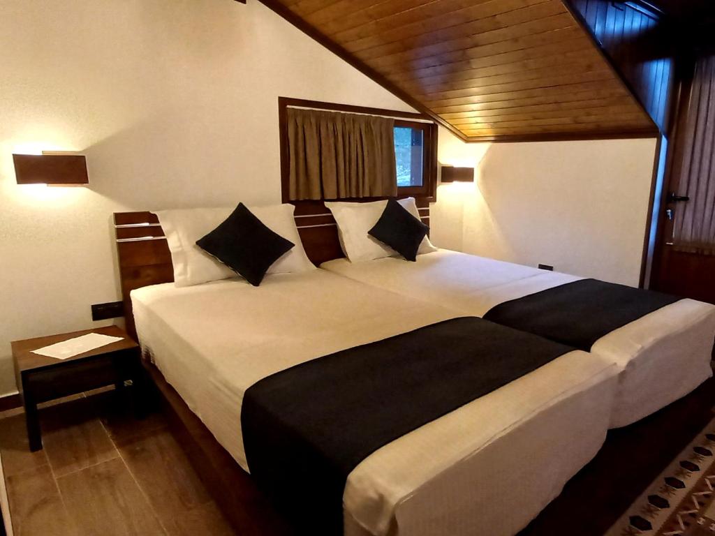 Postel nebo postele na pokoji v ubytování KALE GUESTHOUSE