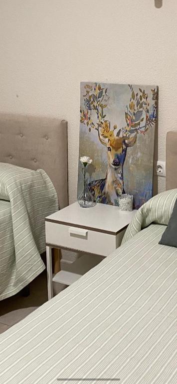 Postel nebo postele na pokoji v ubytování Hostal Restaurante Puerto Blanco
