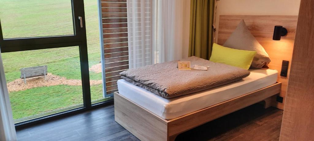 Postel nebo postele na pokoji v ubytování Hotel FÜNF10