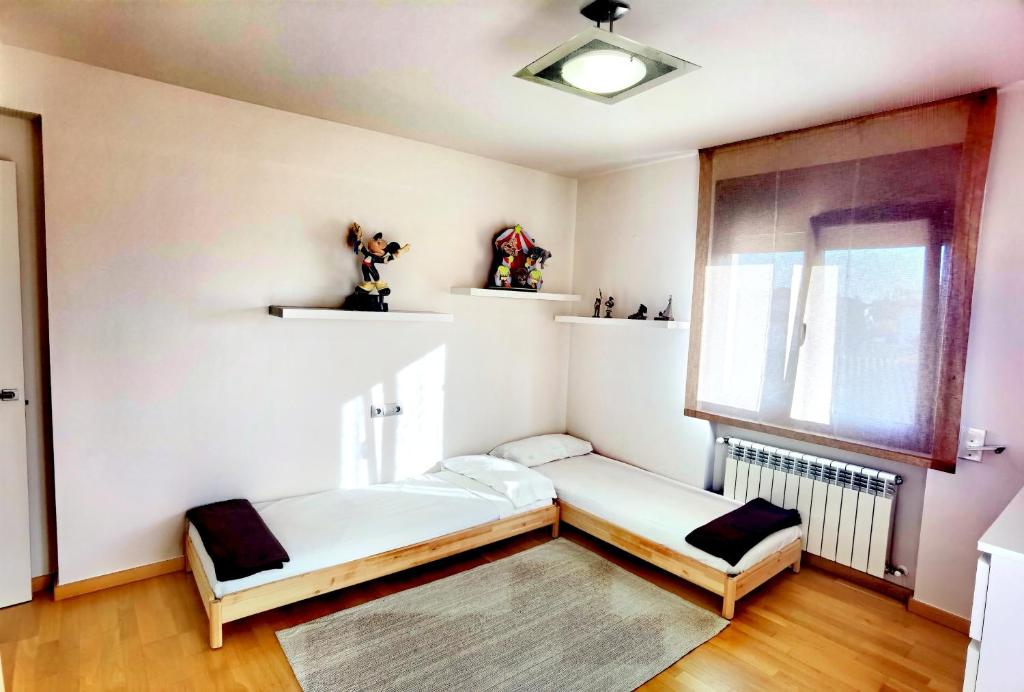 Posteľ alebo postele v izbe v ubytovaní CASA YLENIA