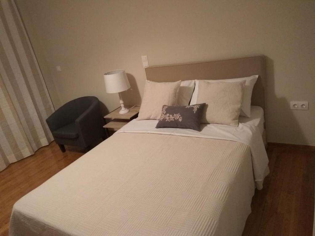 Cama ou camas em um quarto em MARIA'S HOUSE