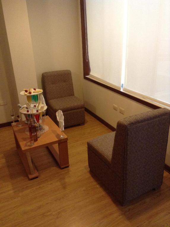 Posezení v ubytování Miculla Hotel