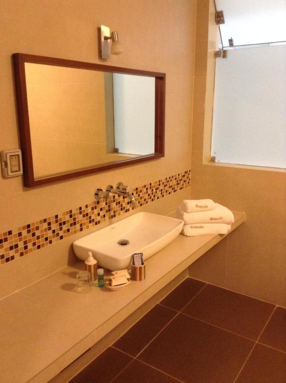 Koupelna v ubytování Miculla Hotel