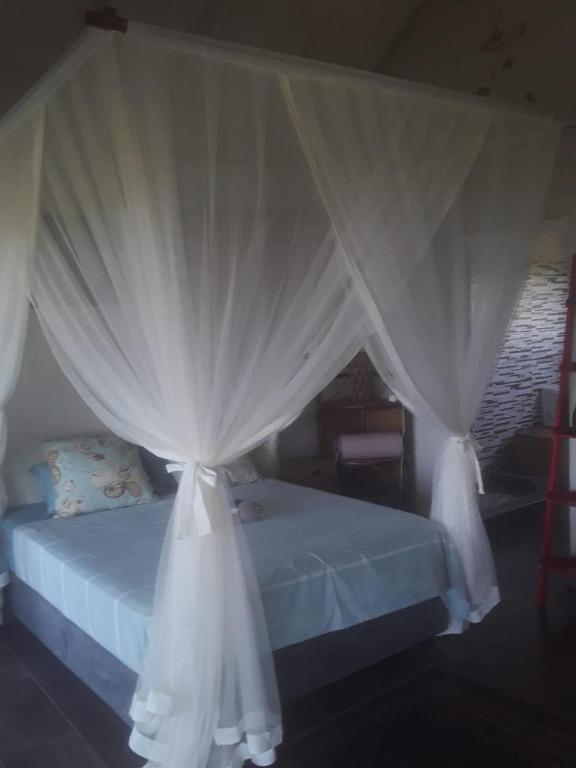 Letto o letti in una camera di Chilled Vibes