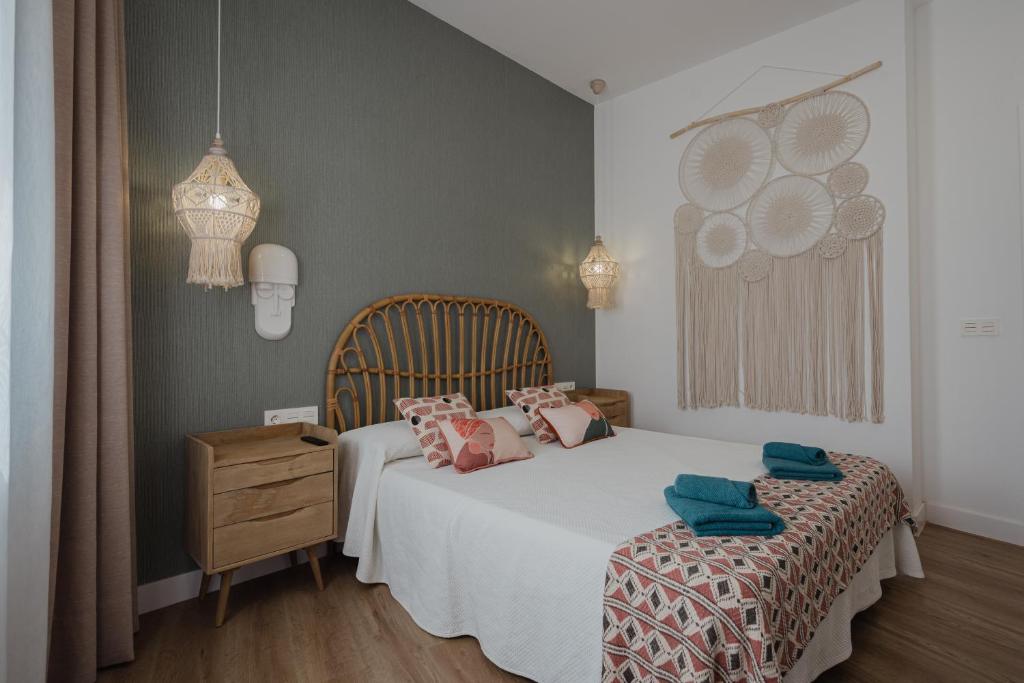 
Cama o camas de una habitación en La Pardela Excellence Apartamentos
