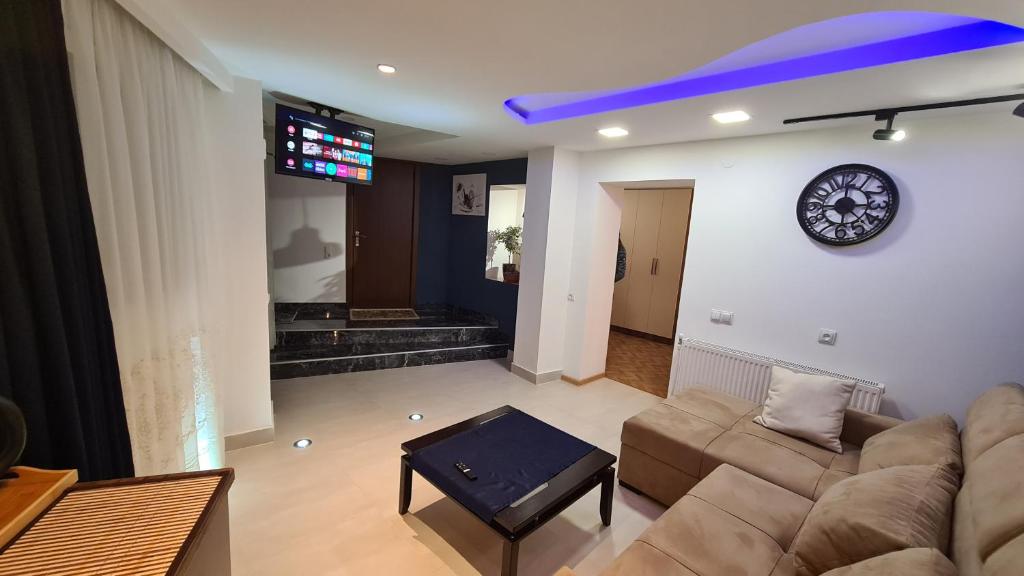 TV a/nebo společenská místnost v ubytování Hotel ULYSSES