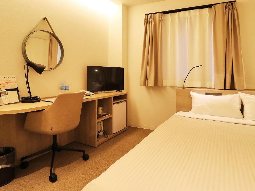 TV a/nebo společenská místnost v ubytování Odawara Terminal Hotel