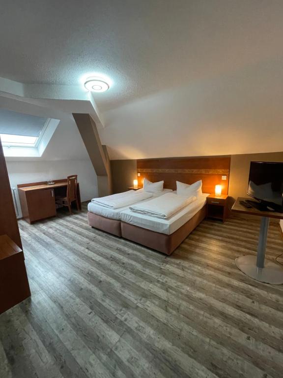 Postel nebo postele na pokoji v ubytování Hotel Monte Cristo