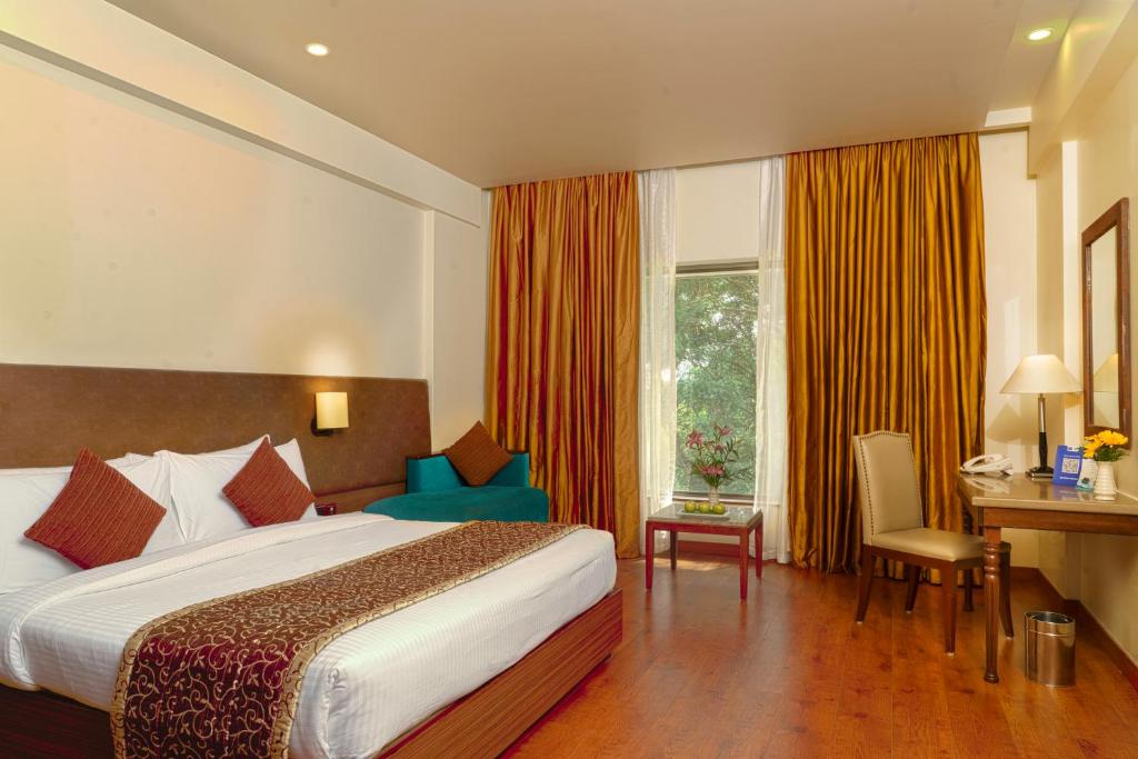 Postel nebo postele na pokoji v ubytování Fortune Pandiyan Hotel, Madurai - Member ITC Hotels' Group