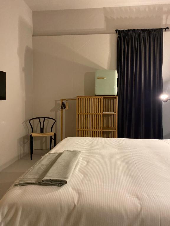 Posteľ alebo postele v izbe v ubytovaní Casimiro Rooms