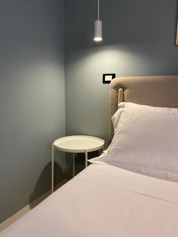 Posteľ alebo postele v izbe v ubytovaní Casimiro Rooms