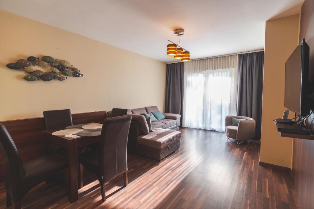 Posezení v ubytování Velence Sunset Wellness Apartman