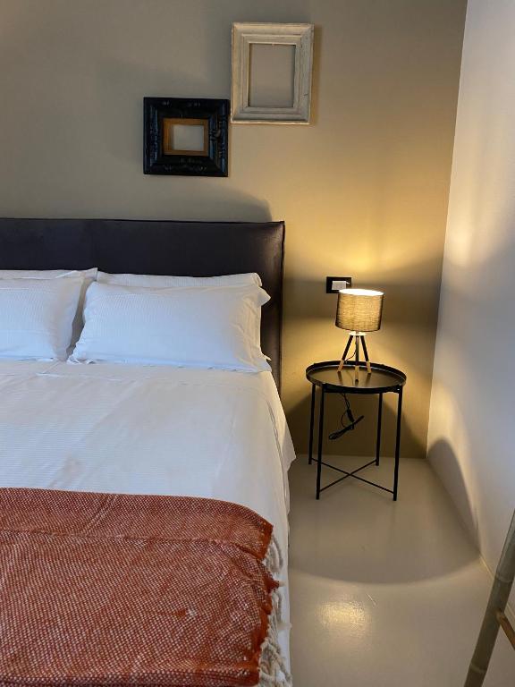 Posteľ alebo postele v izbe v ubytovaní Casimiro Rooms