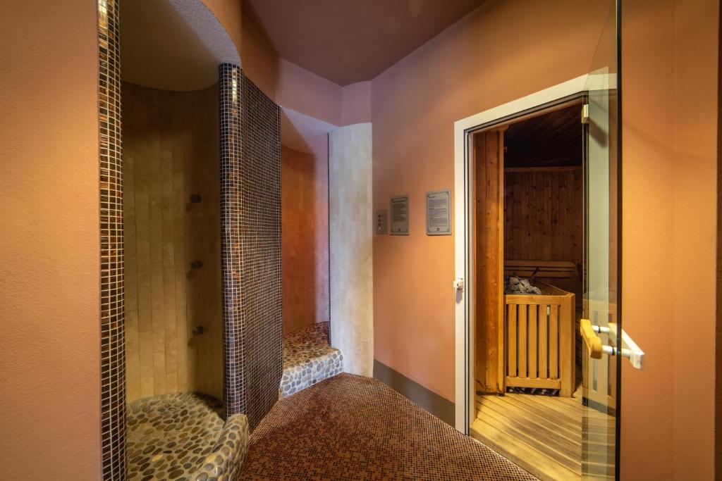 Postel nebo postele na pokoji v ubytování Relais Villa D'Amelia