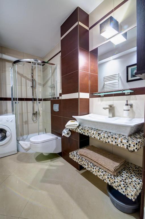 Kúpeľňa v ubytovaní Krynica Apartamenty Centrum Deptak 119