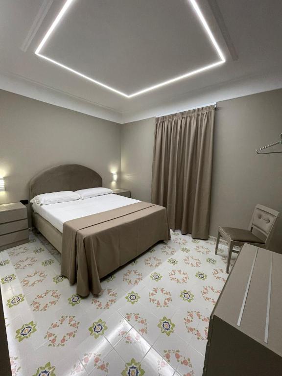 Letto o letti in una camera di Hotel 2000