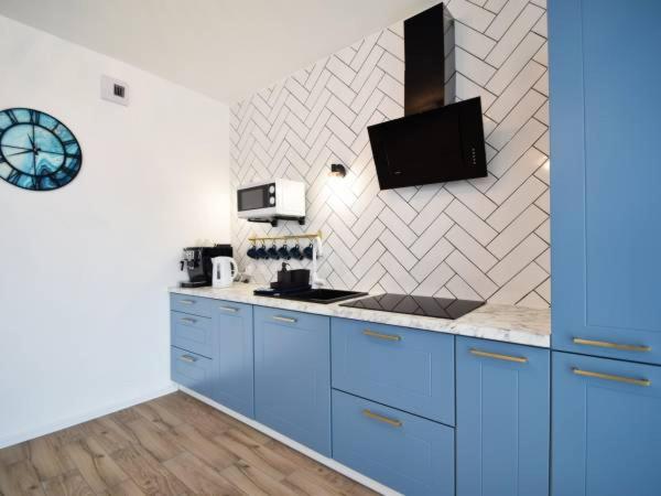 Kuchyňa alebo kuchynka v ubytovaní Apartament Navy Blue