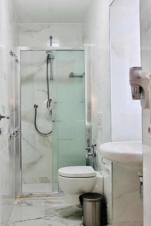 Koupelna v ubytování Hotel 900 Toscana