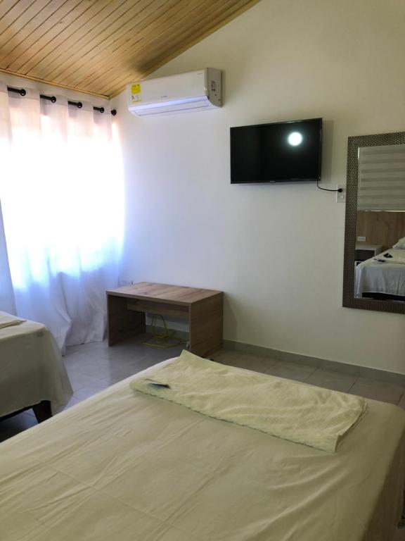 Cama o camas de una habitación en Casa LOURDES