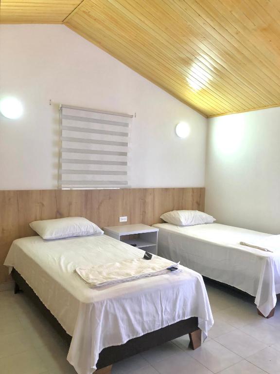 Cama o camas de una habitación en Casa LOURDES