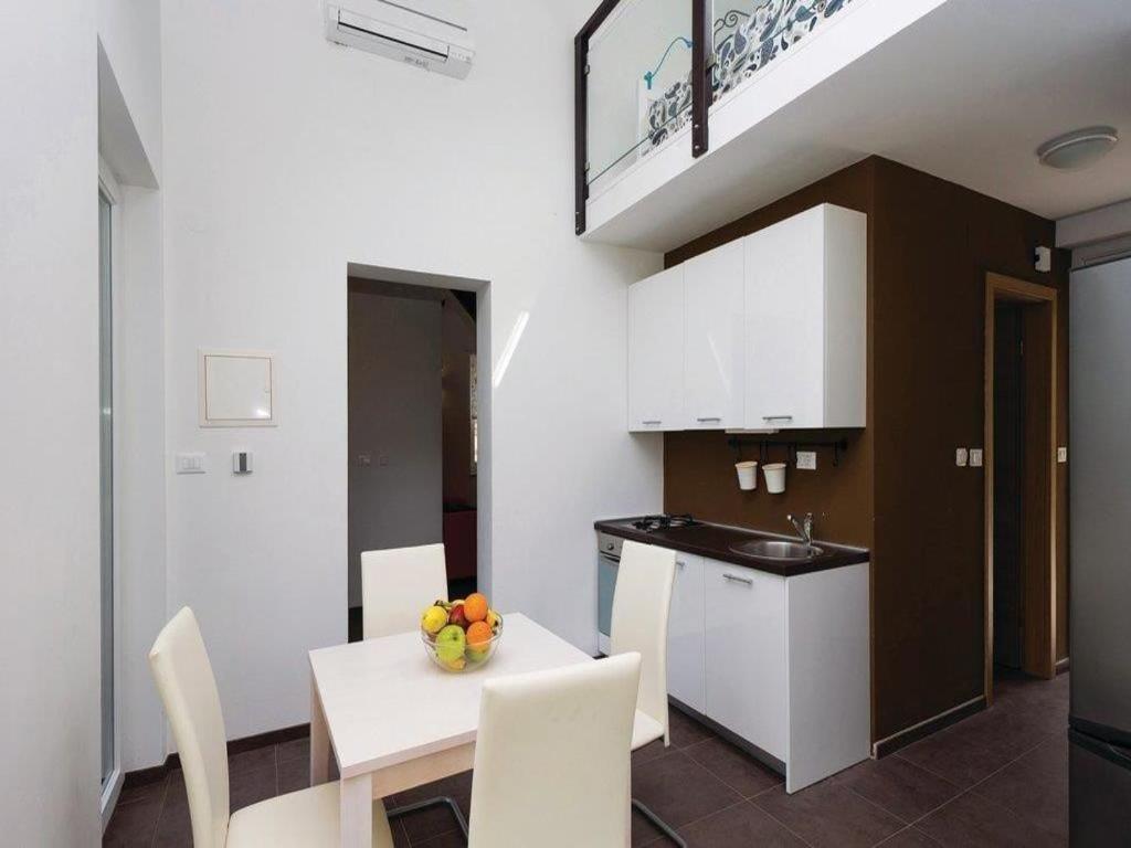 Kuchyň nebo kuchyňský kout v ubytování Apartments Grzic