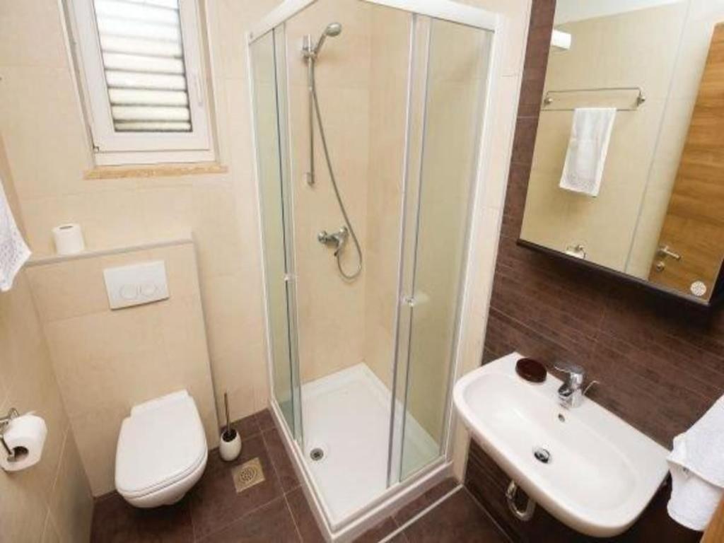 Koupelna v ubytování Apartments Grzic