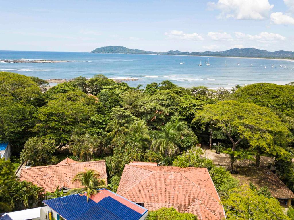 a view of the ocean from a resort at Casa Sueca Hotel - At the Beach in Tamarindo
