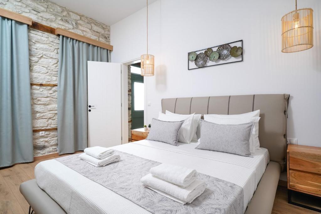 Postel nebo postele na pokoji v ubytování Hibiscus Villa