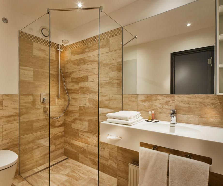 Koupelna v ubytování ElzLand Hotel Pfauen WELLNESS & SPA