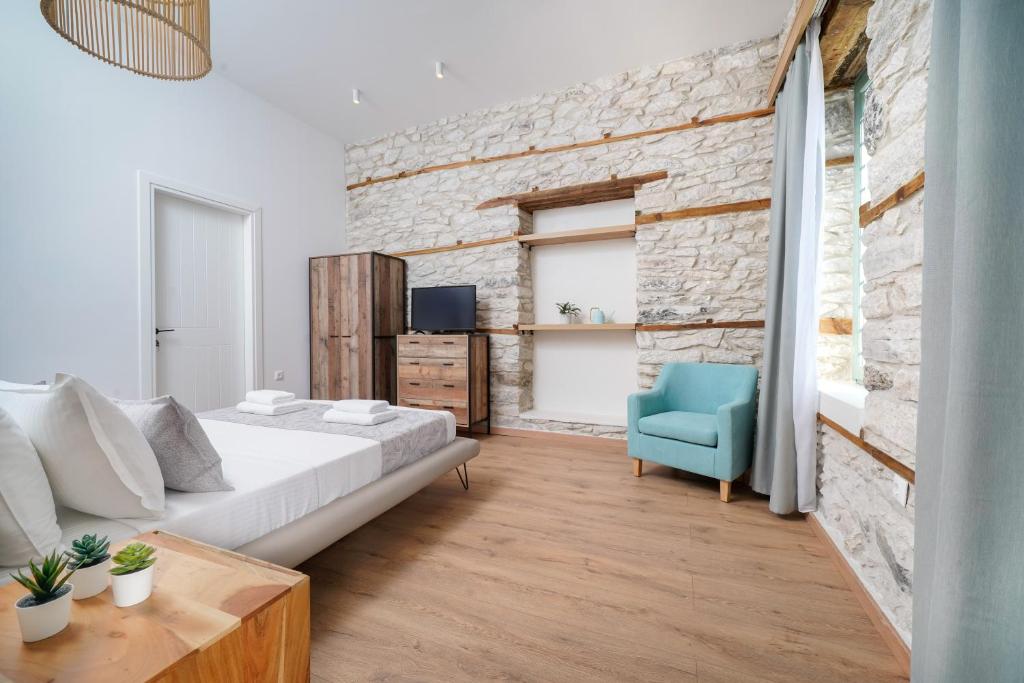 Postel nebo postele na pokoji v ubytování Hibiscus Villa