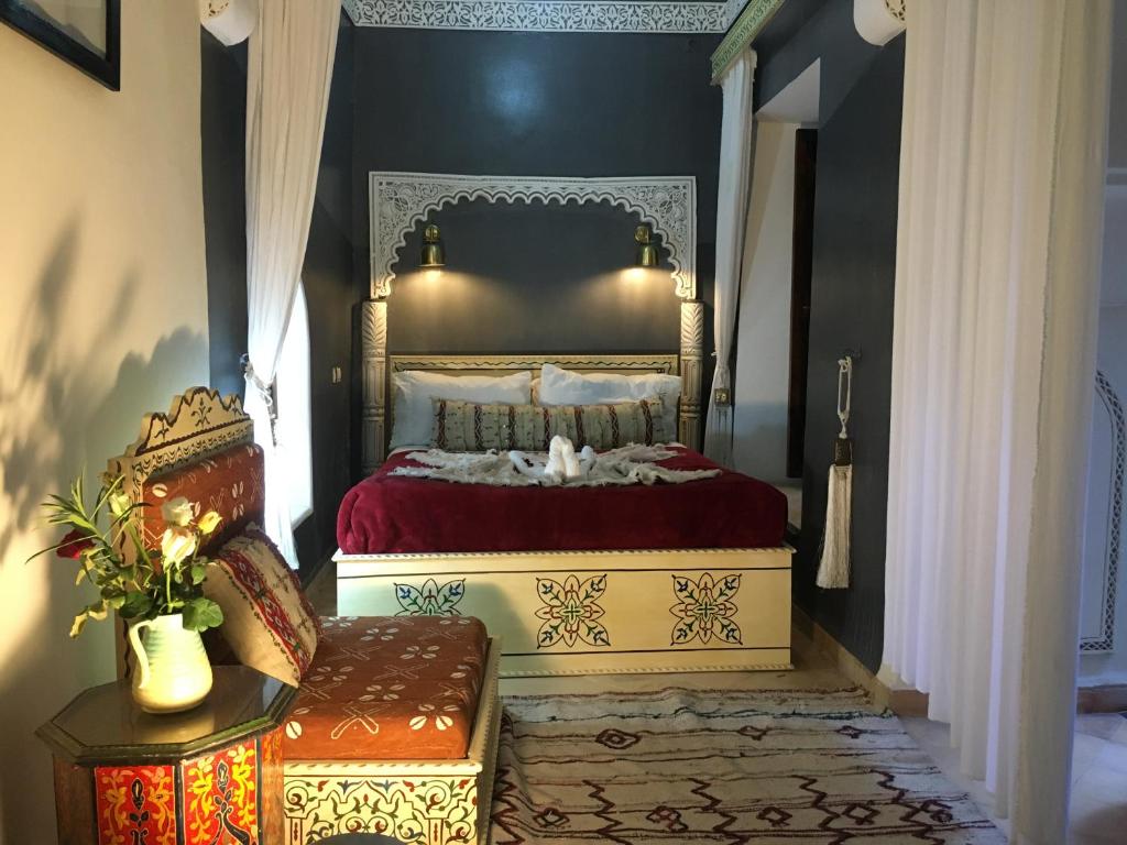 Postel nebo postele na pokoji v ubytování Riad Blue Berber