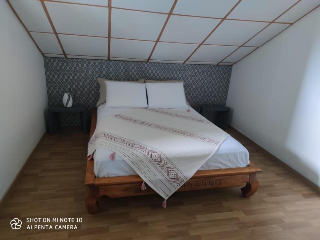 Postel nebo postele na pokoji v ubytování villa Areca