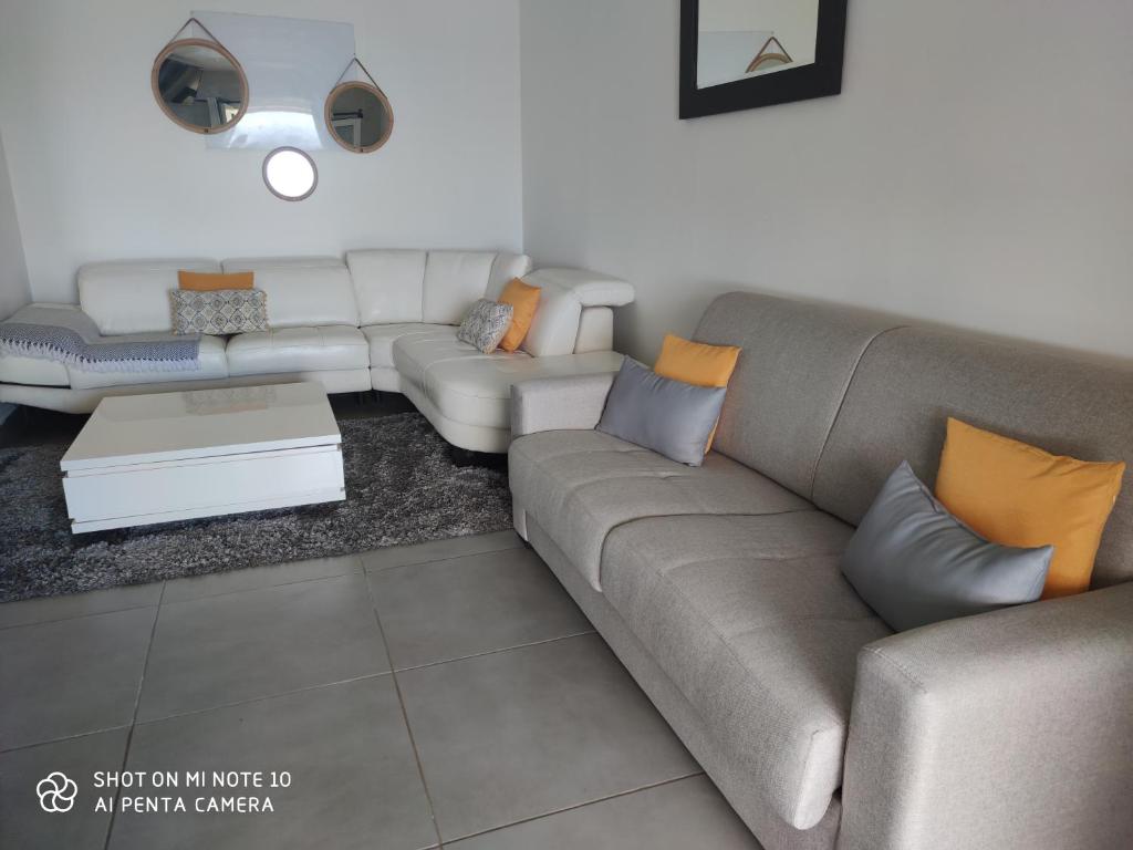 Posezení v ubytování villa Areca