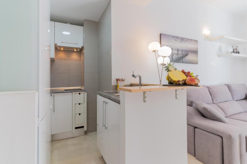Kuchyňa alebo kuchynka v ubytovaní Apartamentos Castillo