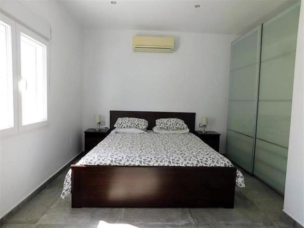 Postel nebo postele na pokoji v ubytování Villa Luxueuse HIVA OA à 3 min à pied de la plage