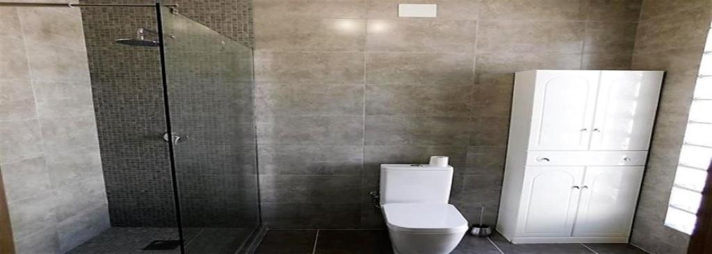 Koupelna v ubytování Villa Luxueuse HIVA OA à 3 min à pied de la plage