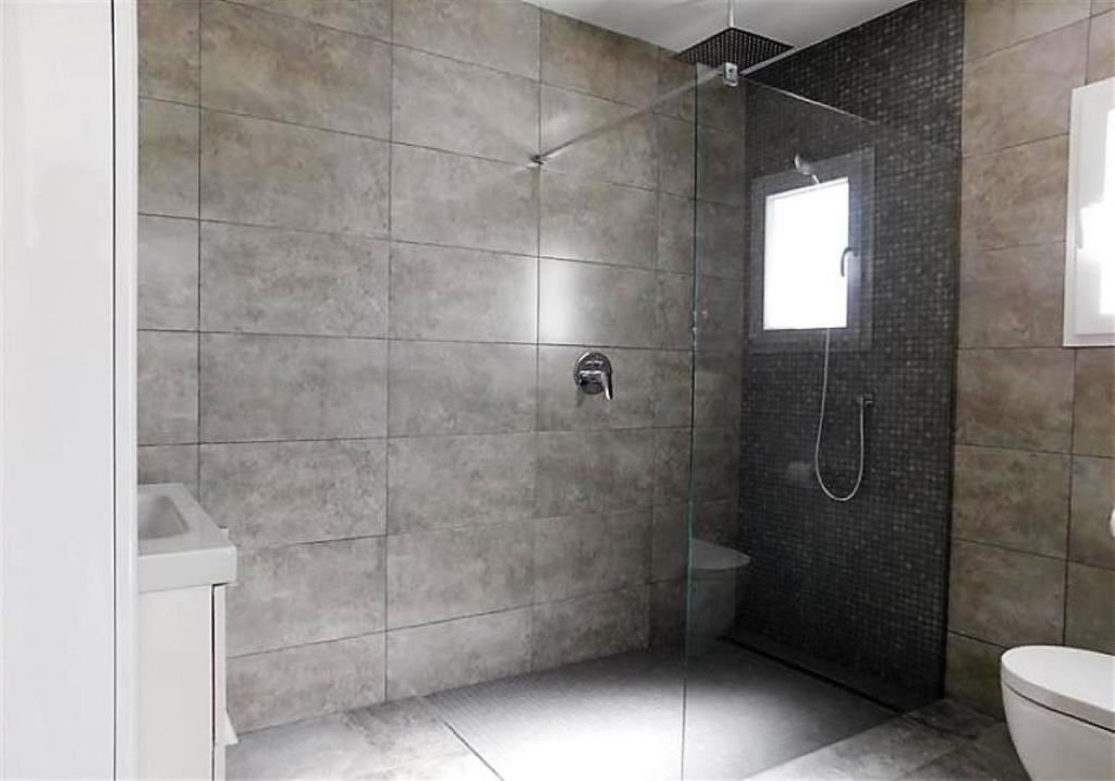 Koupelna v ubytování Villa Luxueuse HIVA OA à 3 min à pied de la plage