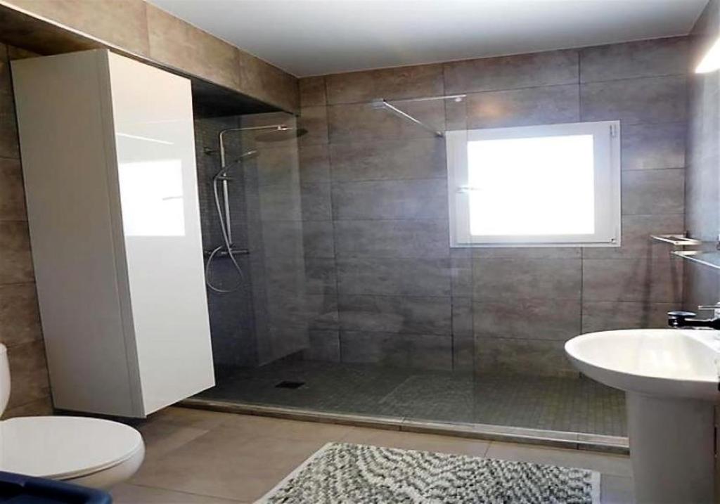 Koupelna v ubytování Villa Luxueuse HIVA OA à 3 min à pied de la plage