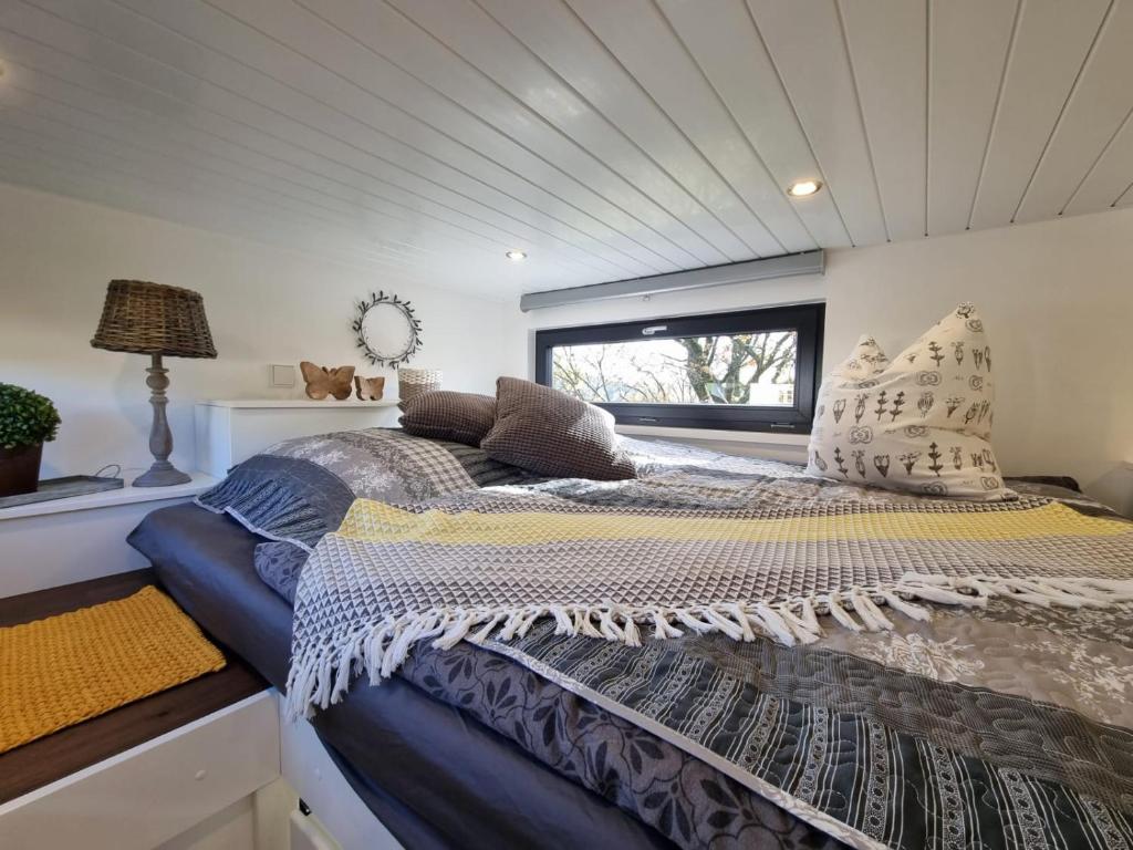 Letto o letti in una camera di Sunset Tiny House GbR