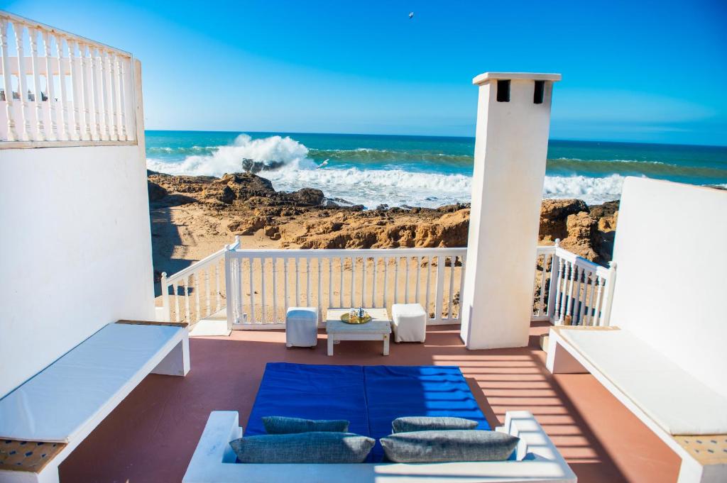 a balcony with a view of the ocean at Dar Cherazade & spa in Essaouira