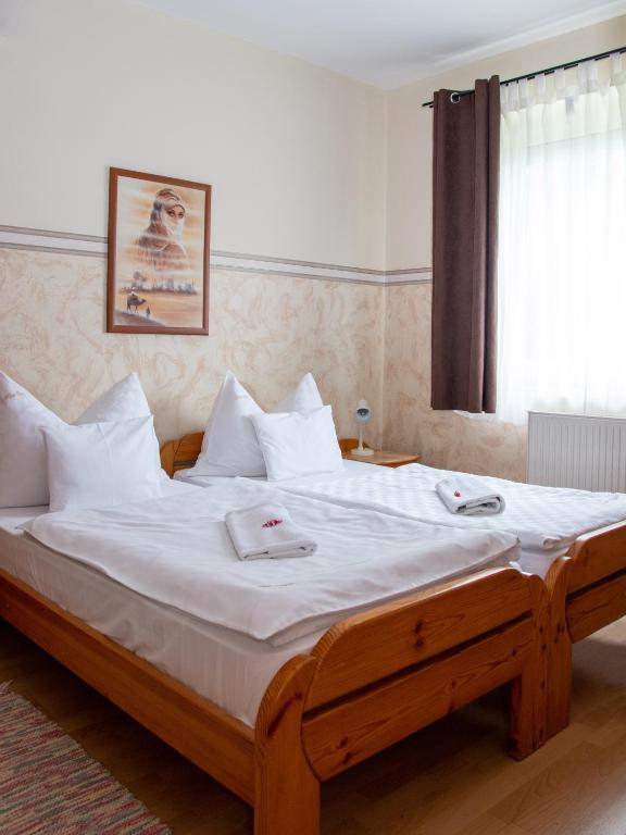 Postel nebo postele na pokoji v ubytování Hotel Zéta