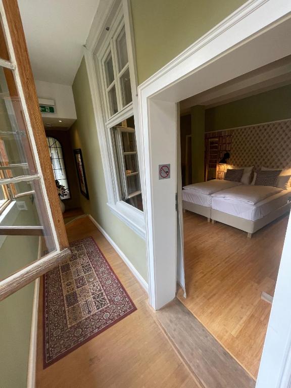 Postel nebo postele na pokoji v ubytování Hotel Zur Alten Brücke
